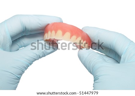 Demountable tooth prostheses in hands of the dentist