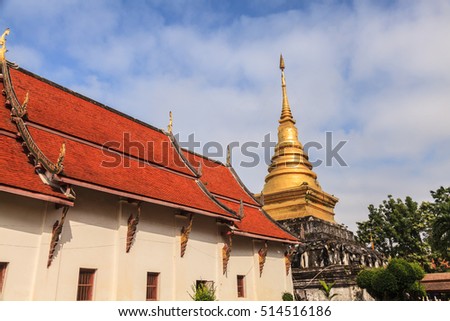 Beautiful golden pagoda with blue sky, Thailand
