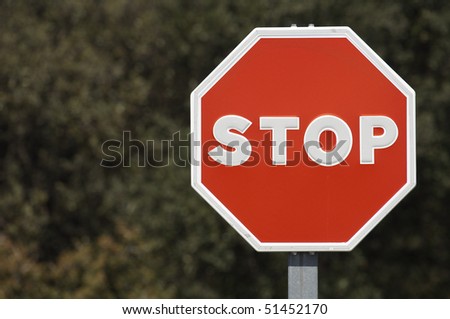 red stop signal with dark background