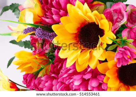 Colorful fabric flowers closeup picture.