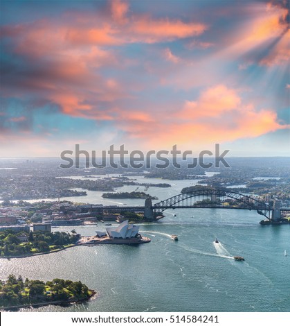 Sydney harbour as seen from helicopter at dusk.