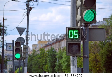 Green traffic light at the crossroads
