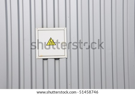 electricity hazard symbol on a warning sign