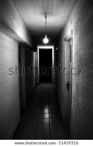 Light shining in dark basement corridor. Motion blur. Royalty-Free Stock Photo #51459316