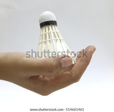 Catch the shuttlecock served isolate on white background