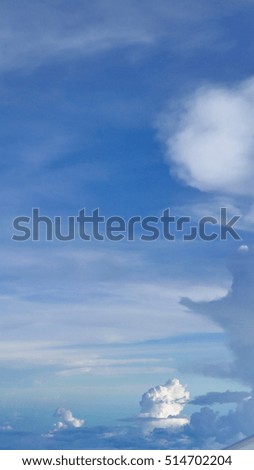 Vertical blue sky cloudscape frame layout background
