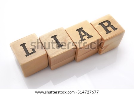 LIAR word made with building blocks isolated on white
