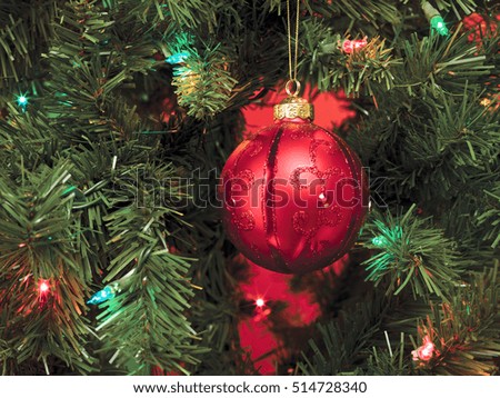 Christmas tree lights closeup.  Can be used as a christmas card background or banner with the ornaments and lights
