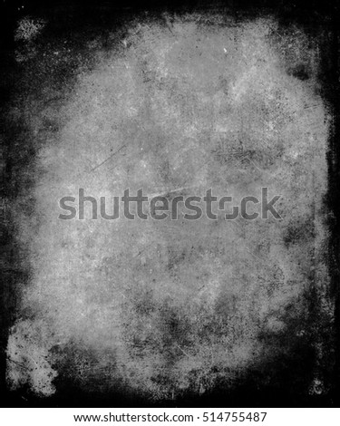 Dark grunge wall. Scratched scary texture with black frame and faded central area for your text or picture