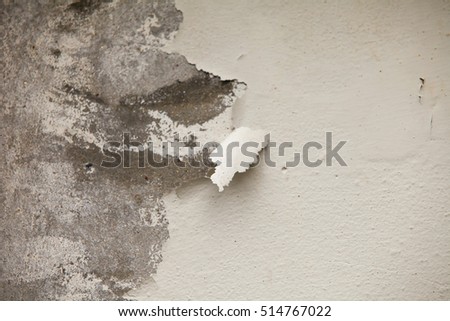 Texture damaged plaster concrete background wall.