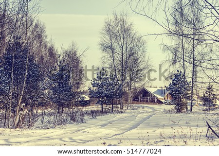 Russian village in the winter. Retro style.