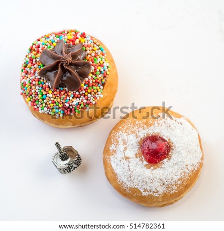Fresh donuts with jelly and chocolate for Hanukkah celebration. 
