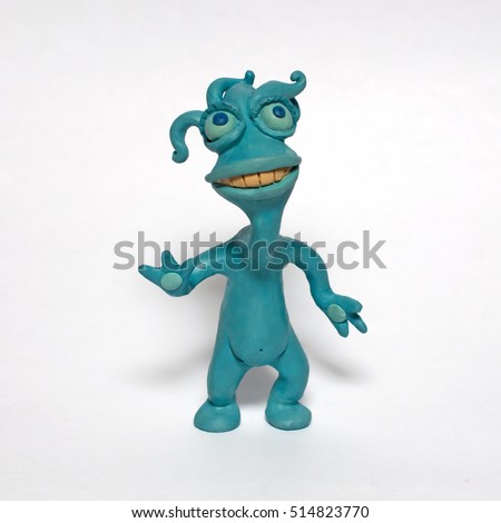 
Cobbled together from plasticine funny original monsters. Isolated character on white background Royalty-Free Stock Photo #514823770