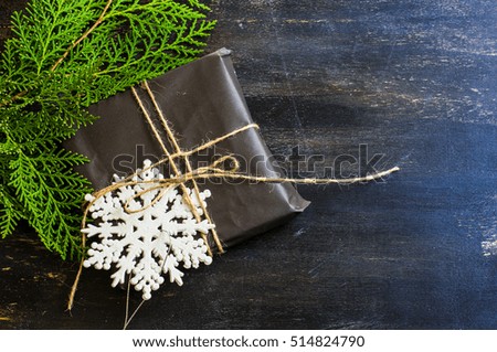 Christmas presents in rustic style with holiday decorations, selective focus