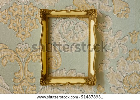 golden frame on the wall, vintage background
