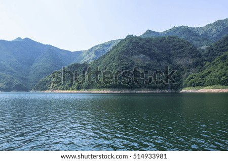 The mountains and reservoir scenery with blue sky