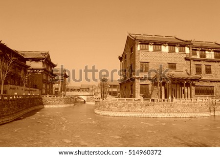 antique buildings and river channel in a ancient city, closeup of photo
