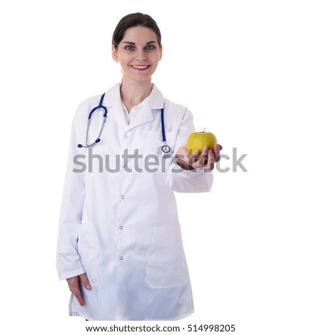 Smiling female doctor in white coat over white isolated background with stethoscope and apple in hand, healthcare, profession and medicine concept