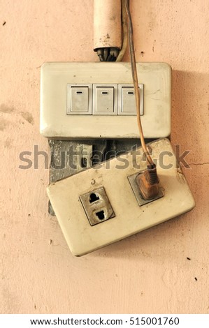 Plug and socket switches home electronics damaged, causing a short circuit.  Safety first.