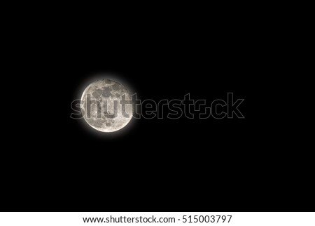 Super moon at black dark background.