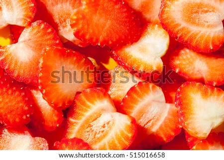 Heart shape of sliced strawberry, prepare for cake decoration.