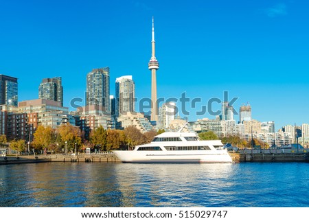 Toronto's skyline with CN Tower over lake. Urban architecture - Canada