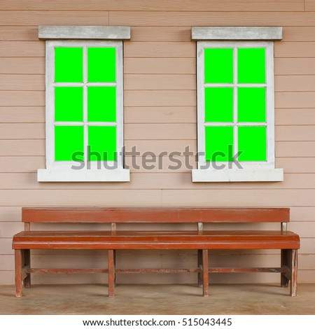 old wood white window with green screen on the wall with long chair or chesterfield vintage cowboy house style scene for background included clipping path for green screen on the window
