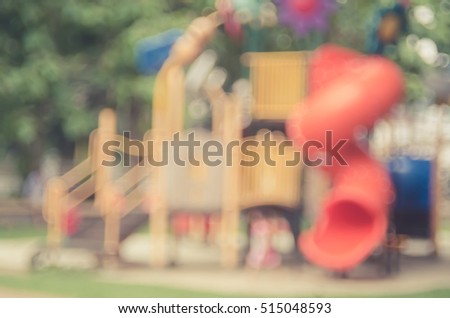 Blur colorful playground in nature green park abstract background. Copy space of sport exercise and health care concept. Vintage tone filter color style.