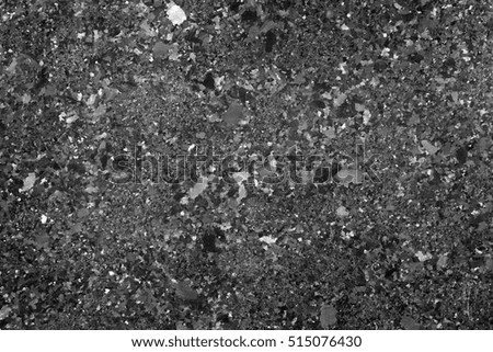 Black granite texture. Close up shot. High resolution photo.