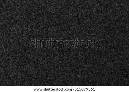 Background of black felt. High resolution photo.
