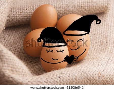 Happy eggs giving gifts for Christmas New year holiday concept.