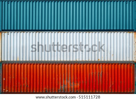 The surface texture of the sea container.Three containers without labels. Royalty-Free Stock Photo #515111728