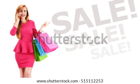 Young woman with shopping bags isolated on white background
