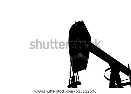 Silhouette of oil pump from oil field.