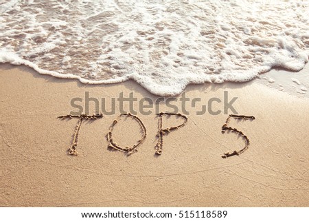 top 5, sign concept, list of five best, text on the sand beach Royalty-Free Stock Photo #515118589