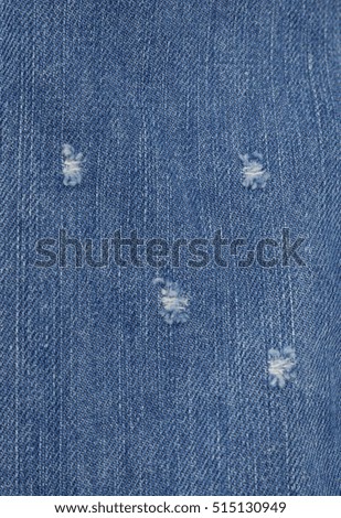 Jeans torn denim texture for background