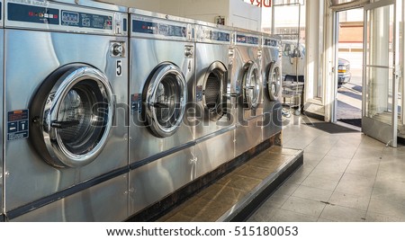 Row of washing machine of laundry business in the public store. Royalty-Free Stock Photo #515180053