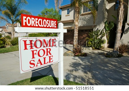 Foreclosure For Sale Real Estate Sign in Front of Beautiful New Home