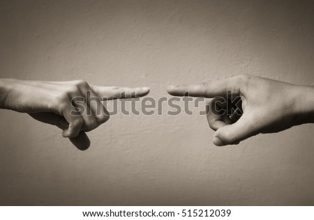 Hands pointing fingers at each other. Blame concept.  Royalty-Free Stock Photo #515212039