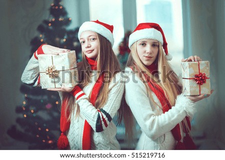 Young Christmas girls smiling with happy expression 