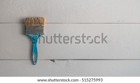 Vintage old blue shabby textured brush on white boards