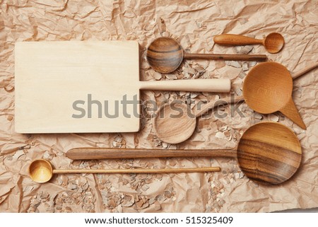 wooden kitchen utensil on baking paper