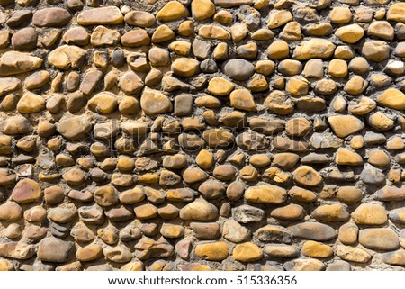 Wall background with small stones