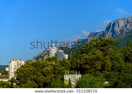 The town in the mountains under the blue sky