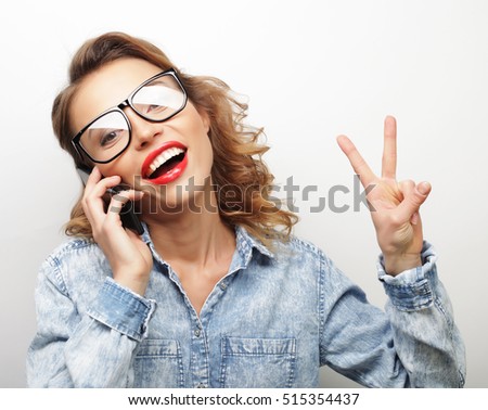 Happy young woman giving thumb up