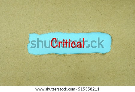 Torn Paper With Text " Critical "
