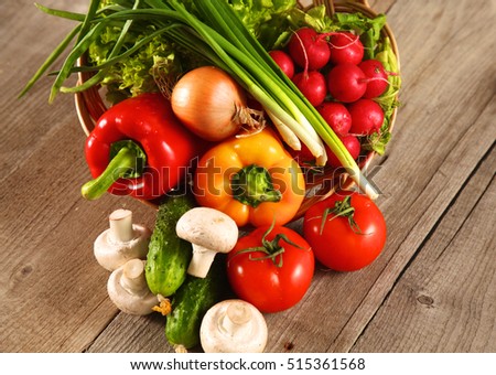 Fresh vegetables on a clean wooden table