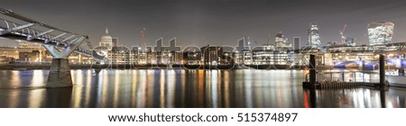 Panoramic view from St. Pauls Cathedral to the city of London by night
