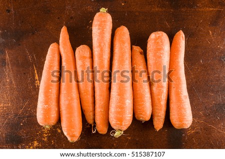 Photo picture Close up of fresh carrots background texture