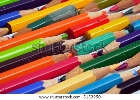 Macro image of used colouring pencils. Focus is in the middle.